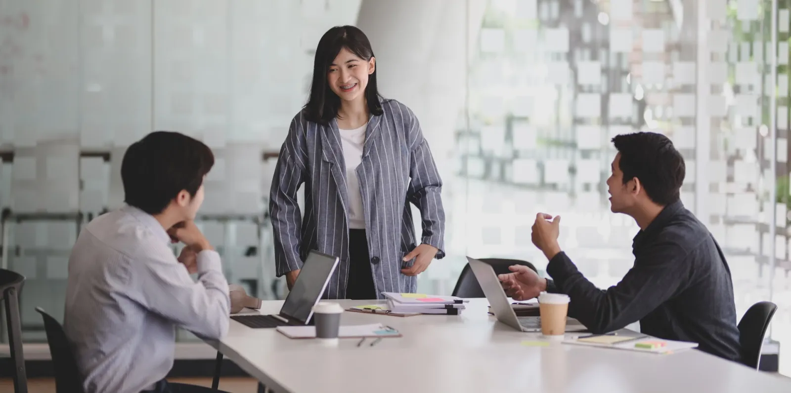 A consulting team collaborating around a table